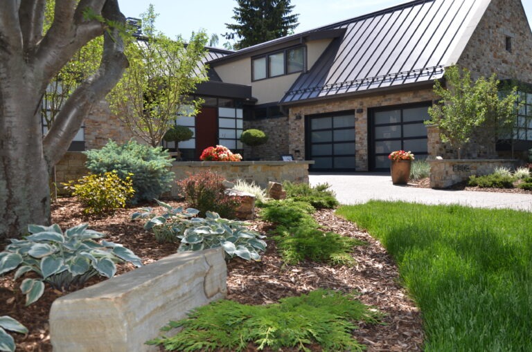 Modern house with many newly planted plants